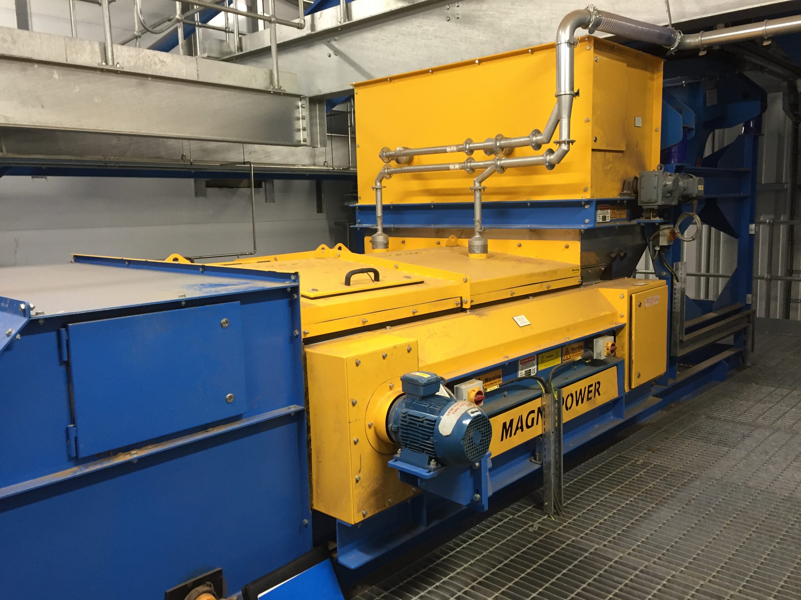 Eddy Current Separator with dust covers for wood waste processing