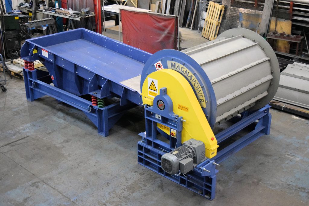 Heavy duty vibratory feeder prior to frag drum