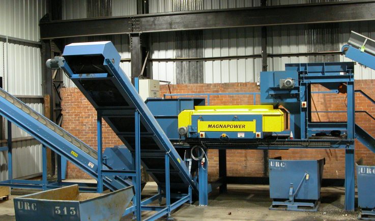 Drum magnet and eddy current separating metals from shredded electrical waste
