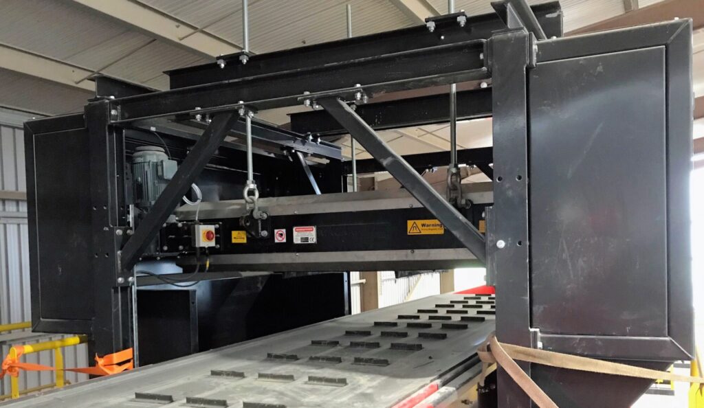 Overband magnetic separator removing ferrous metals from waste stream in a recycling and magnetic separation system. data-large-image=