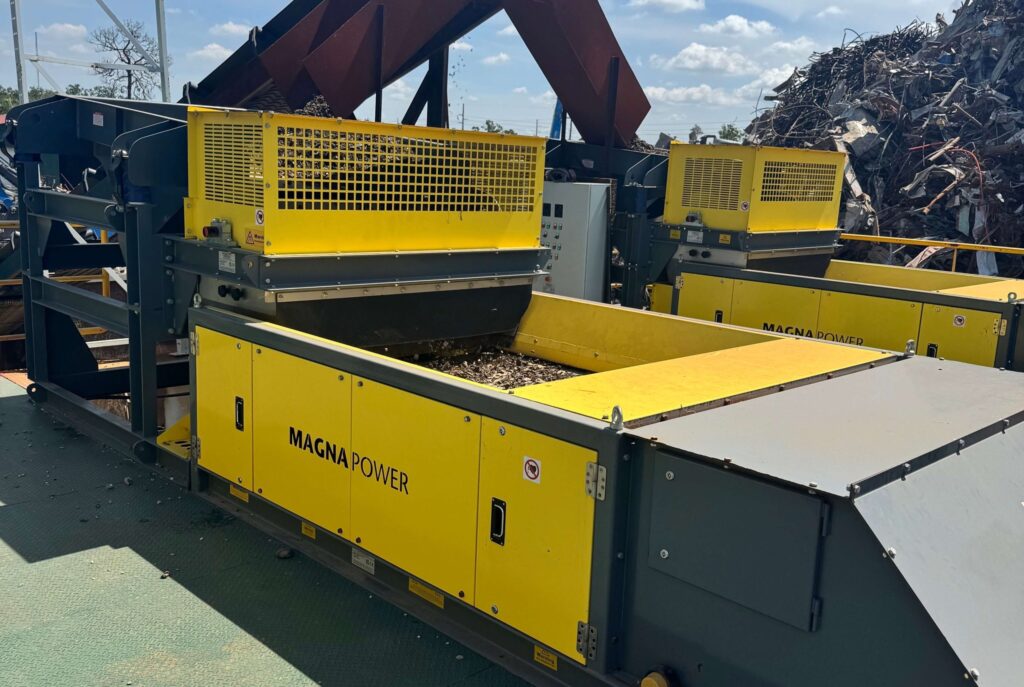 Three eddy current separators at Scrap King Florida processing different size fractions of eddy current waste with magnetic separation technologies. data-large-image=