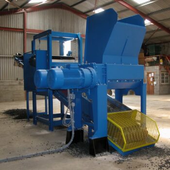 Image of a tyre shredding plant conveyor system with magnetic steel separation using a crossbelt overband magnet and a magnetic head pulley.