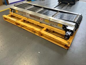 Overband magnet with a heavy-duty armoured belt, built to customer specification.